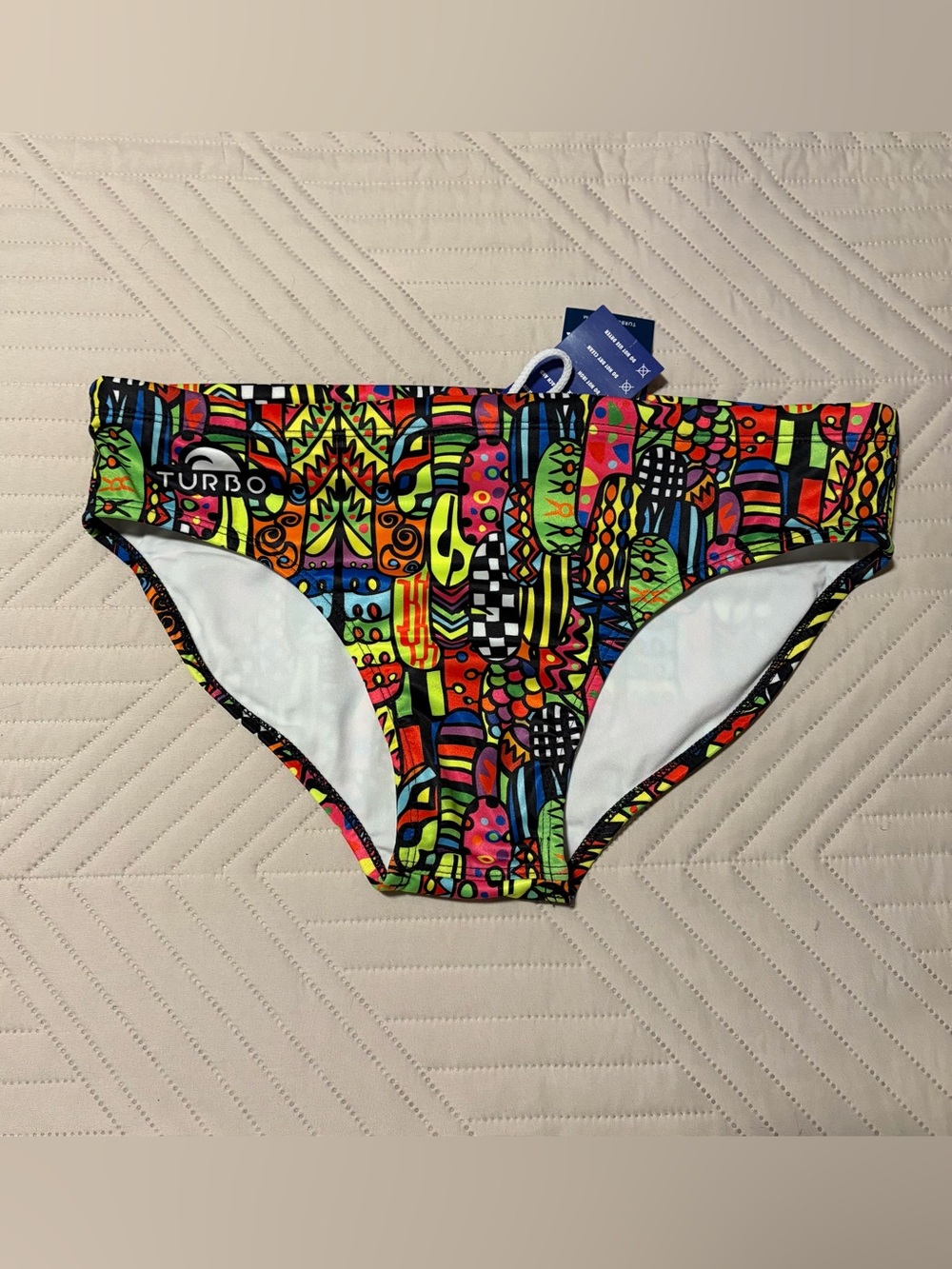 Turbo Multicolor Geometric Swim Briefs - Neon Print
Size 38 
2XL